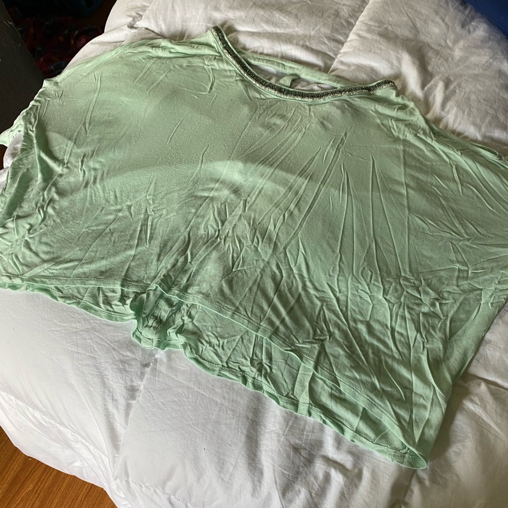 Float teal crop top